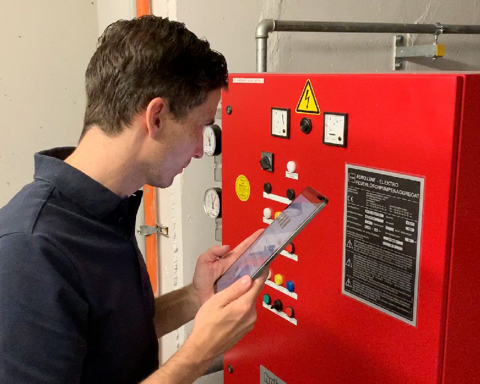 Surveyor with tablet by control panel